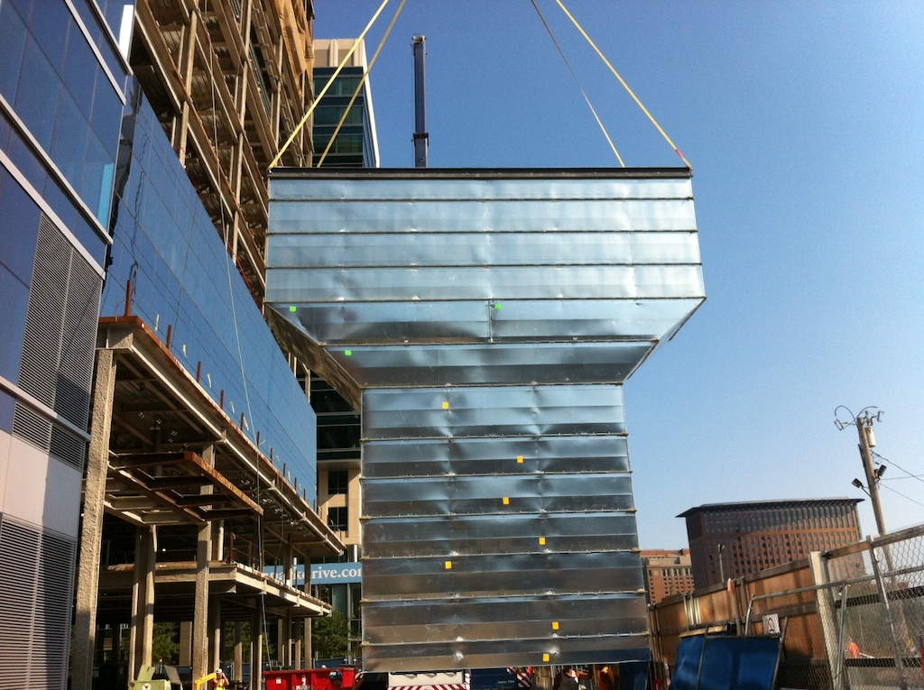 large ductwork lifted by crane