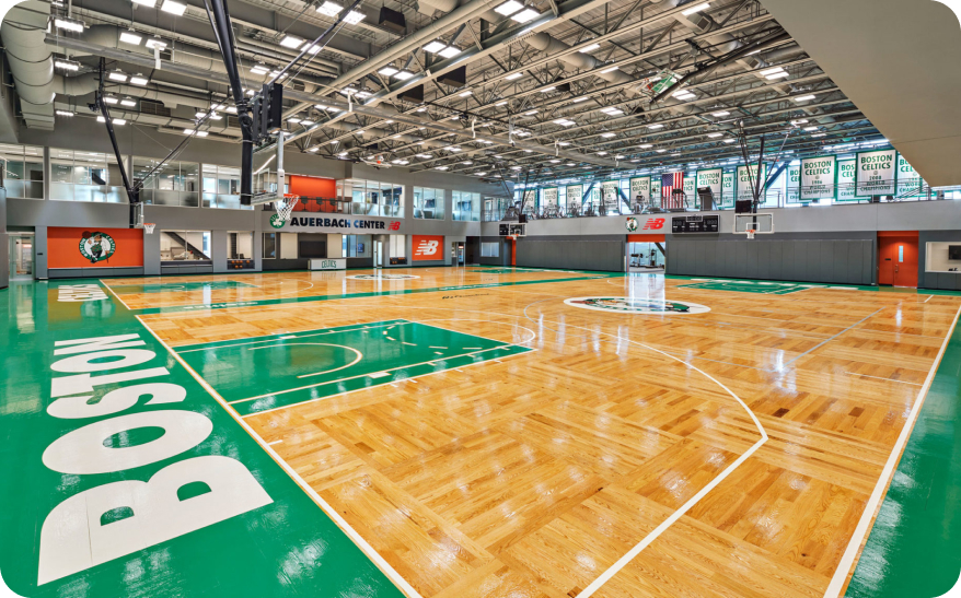 basketball court in auerbach center with celtics logo 